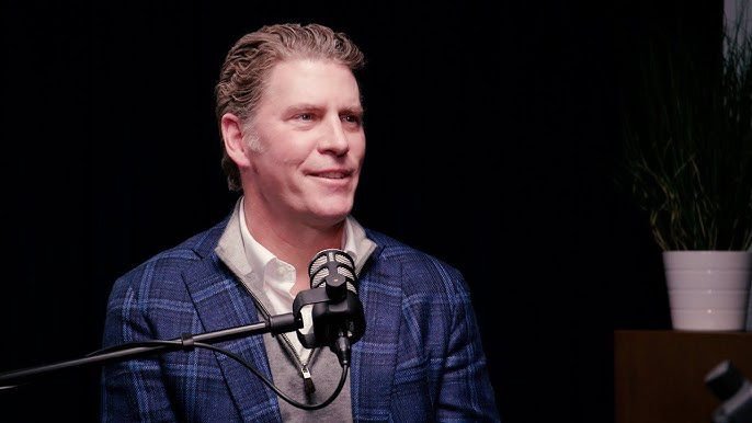 Bo French speaking into a microphone